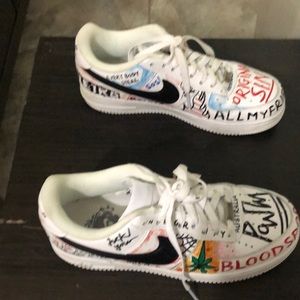 Custom Nike Air Force ones. Pauly graffiti style.